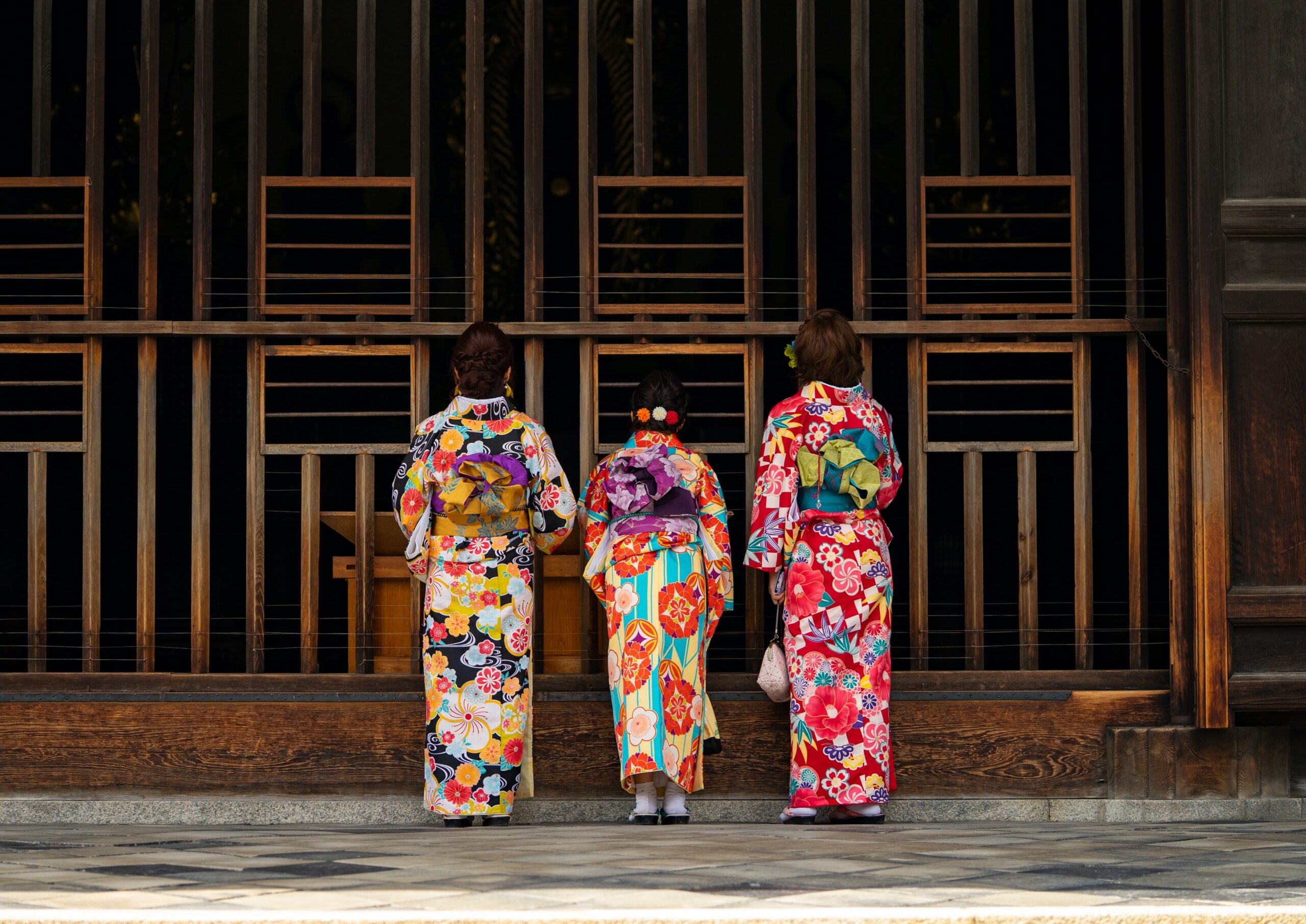 Three Japanese girls in traditional cloths
